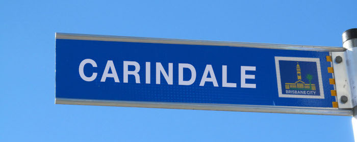 road sign that says Carindale