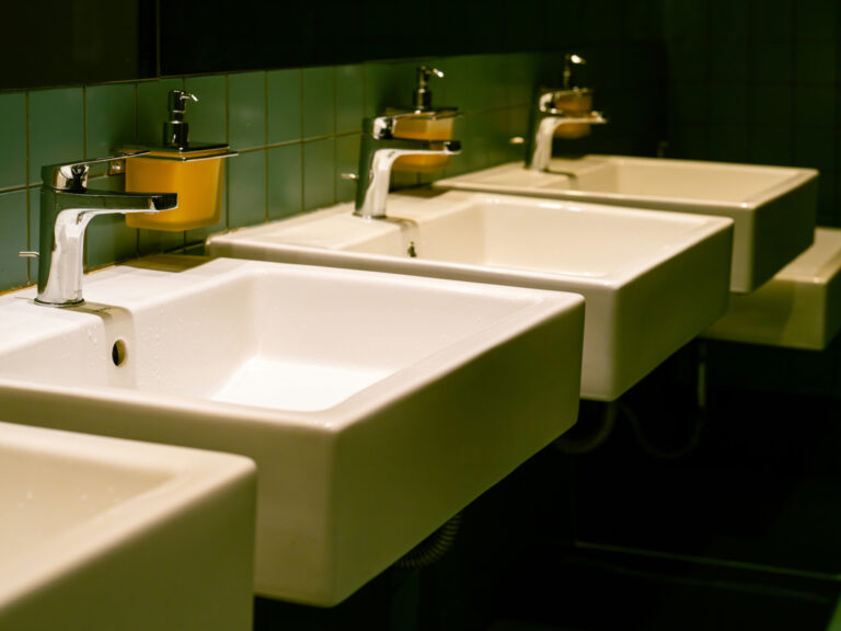 Row of clean white sinks